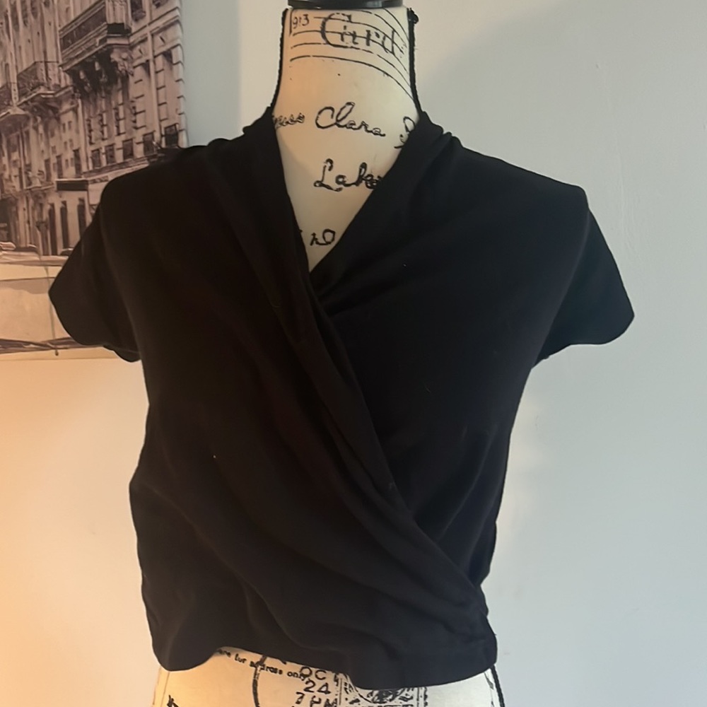 Anthropologie’s black front wrap top XS